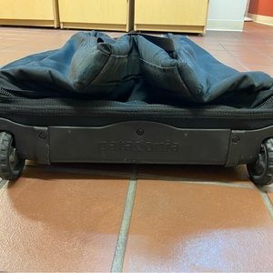Patagonia hardback, rolling duffel.